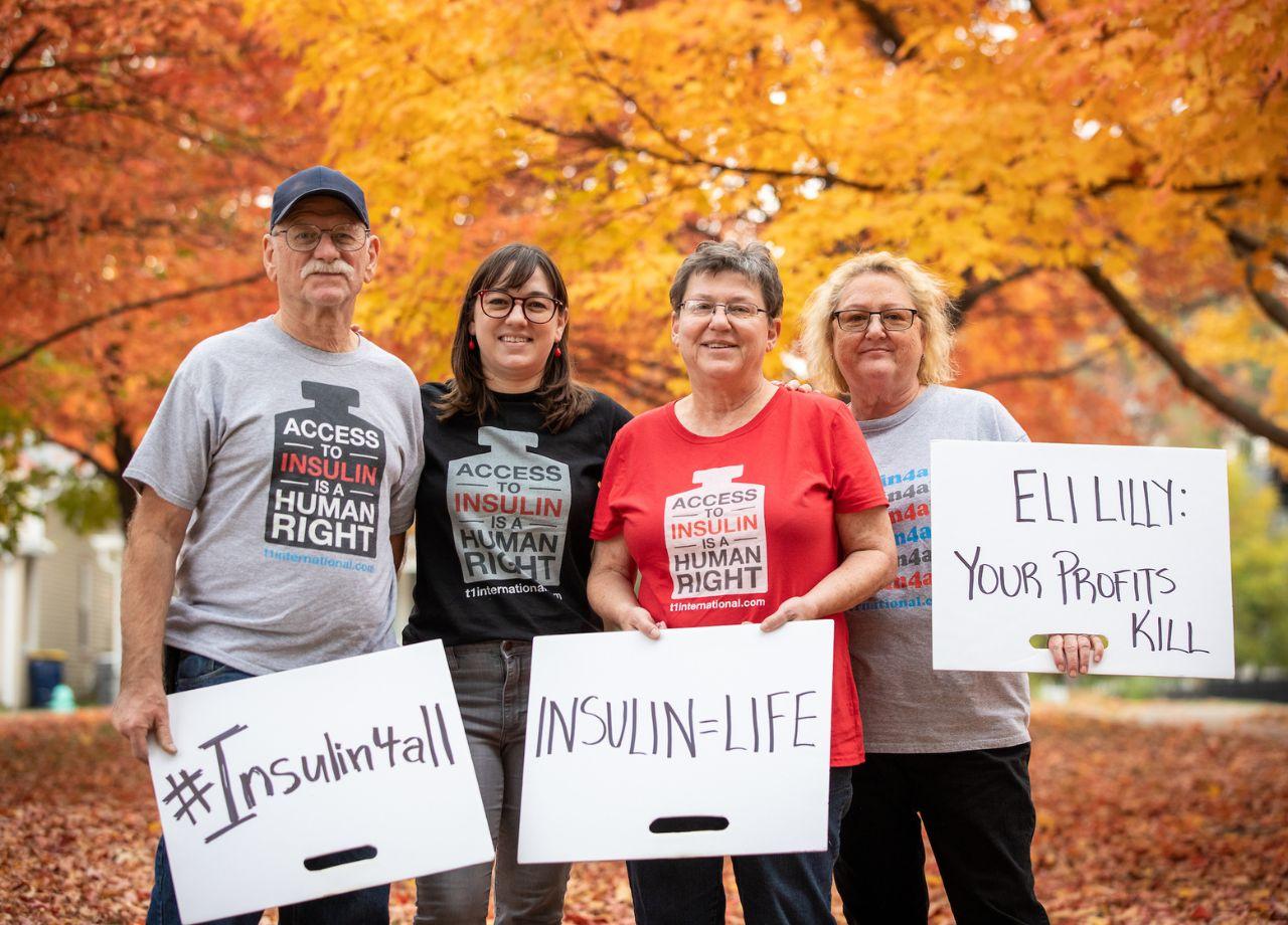 Elizabeth Pfiester and her family at a demonstration in Indianapolis / © Erin Lubin